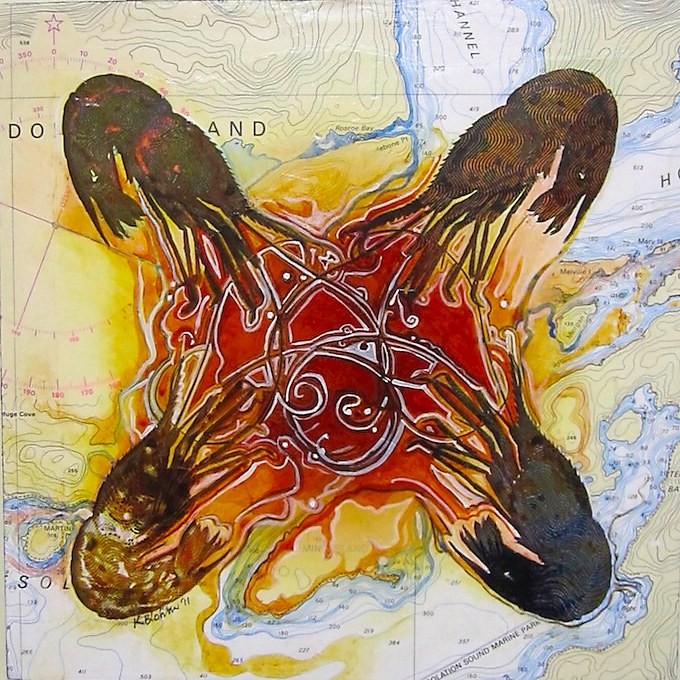 Four spot prawns painted head-outward in a cross over a marine chart of the Broughton Archipelago, with a red knotwork medallion at the centre